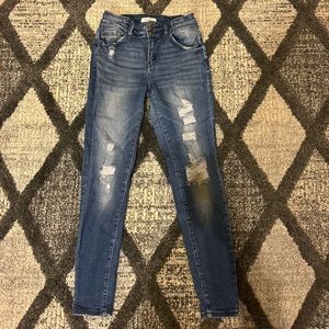 (Kan Can mid rise blue skinny jeans)